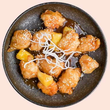 Курка в кисло-солодкому соусі з ананасом